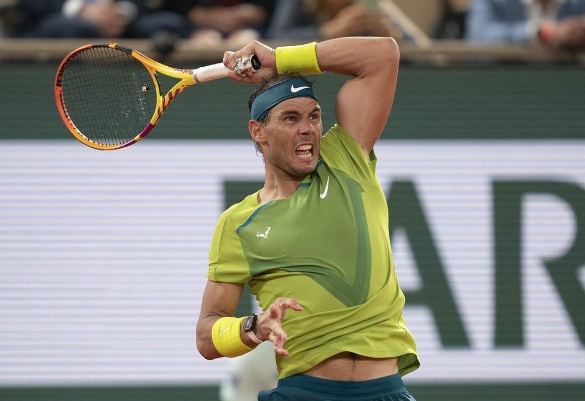 June 3, 2022; Paris, France; Rafael Nadal (ESP) follows through  a shot during his semifinal match against Alexander Zverev (GER) on day 13 of the French Open at Stade Roland-Garros.