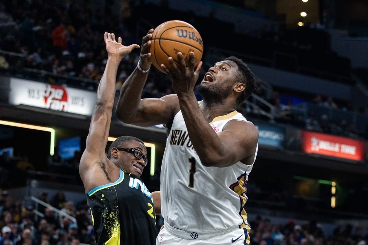 Feb 28, 2024; Indianapolis, Indiana, USA; New Orleans Pelicans forward Zion Williamson (1) shoots the ball while Indiana Pacers forward Jalen Smith (25) defends in the first half at Gainbridge Fieldhouse.