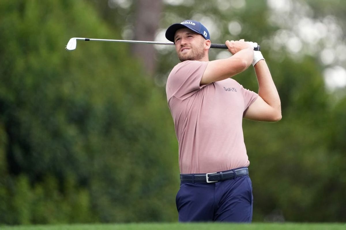 Apr 11, 2024; Augusta, Georgia, USA; Wyndham Clark plays his shot from the fourth tee during the first round of the Masters Tournament.