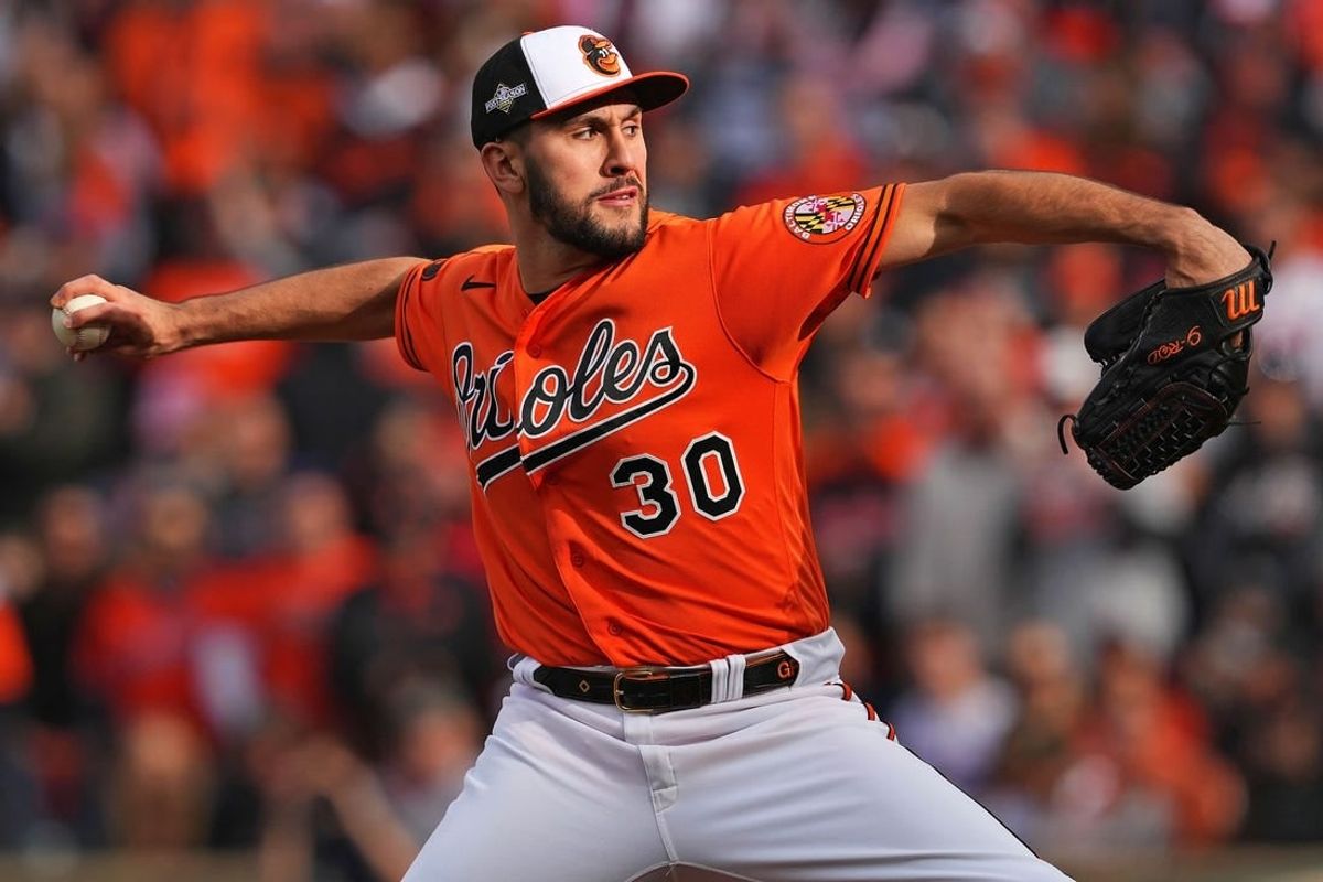 Oct 8, 2023; Baltimore, Maryland, USA; Baltimore Orioles starting pitcher Grayson Rodriguez (30) pitches during the first inning against the Texas Rangers during game two of the ALDS for the 2023 MLB playoffs at Oriole Park at Camden Yards.