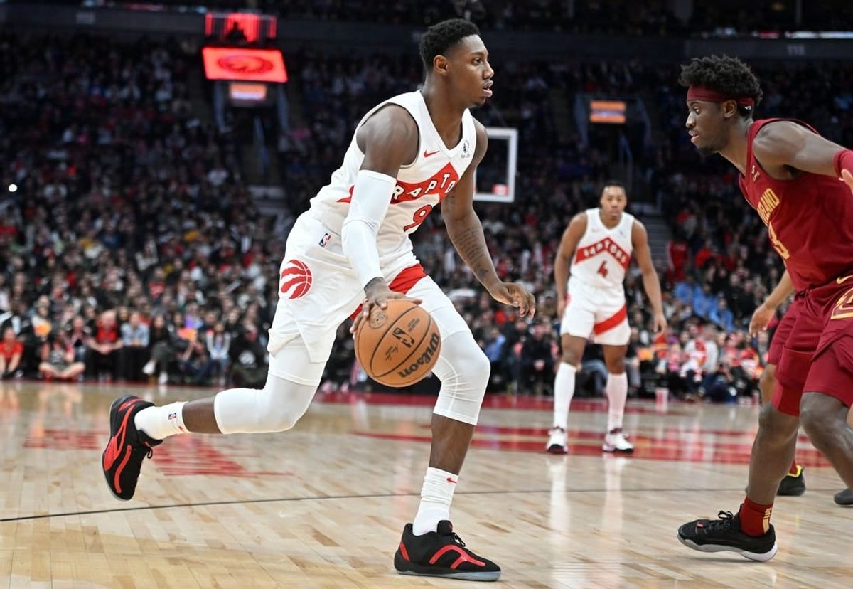Jan 1, 2024; Toronto, Ontario, CAN;  Toronto Raptors forward RJ Barrett (9) dribbles the ball up court against the Cleveland Cavaliers in the second half at Scotiabank Arena.