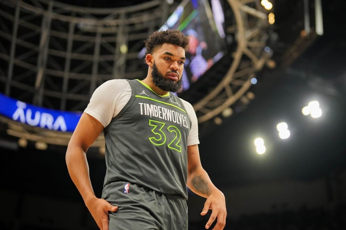 Jan 22, 2024; Minneapolis, Minnesota, USA; Minnesota Timberwolves center Karl-Anthony Towns (32) sets a franchise record with 62 points against the Charlotte Hornets at Target Center.
