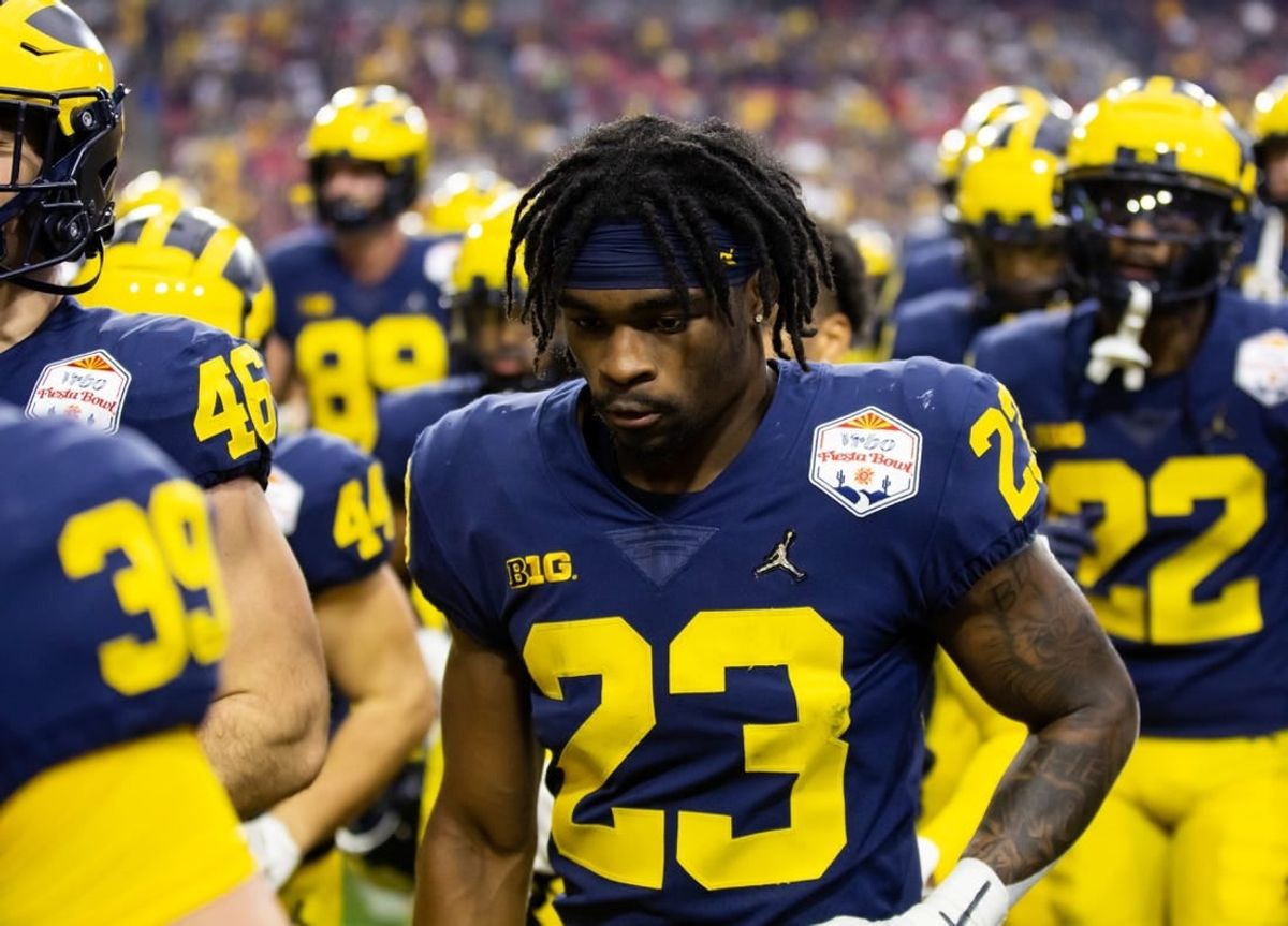 Dec 31, 2022; Glendale, Arizona, USA; Michigan Wolverines running back CJ Stokes (23) against the TCU Horned Frogs during the 2022 Fiesta Bowl at State Farm Stadium.