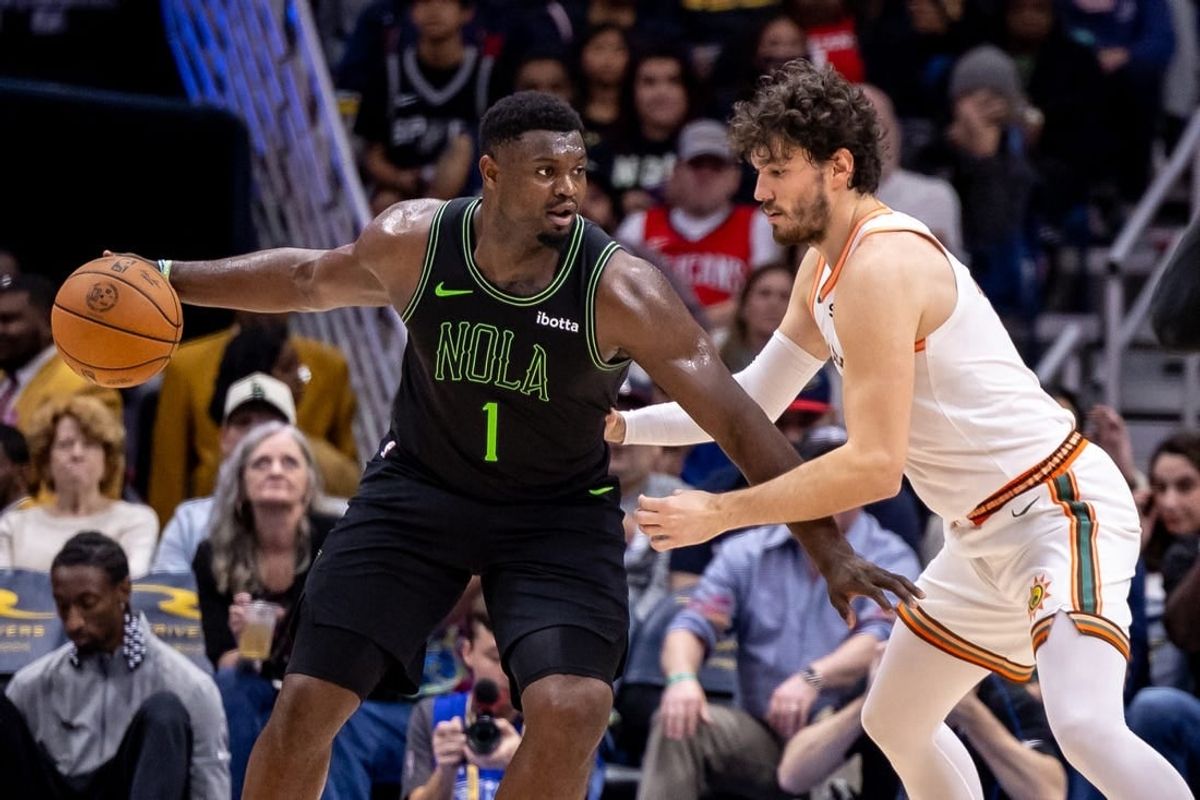Dec 1, 2023; New Orleans, Louisiana, USA; New Orleans Pelicans forward Zion Williamson (1) looks for separation against San Antonio Spurs forward Cedi Osman (16) during the second half at the Smoothie King Center.