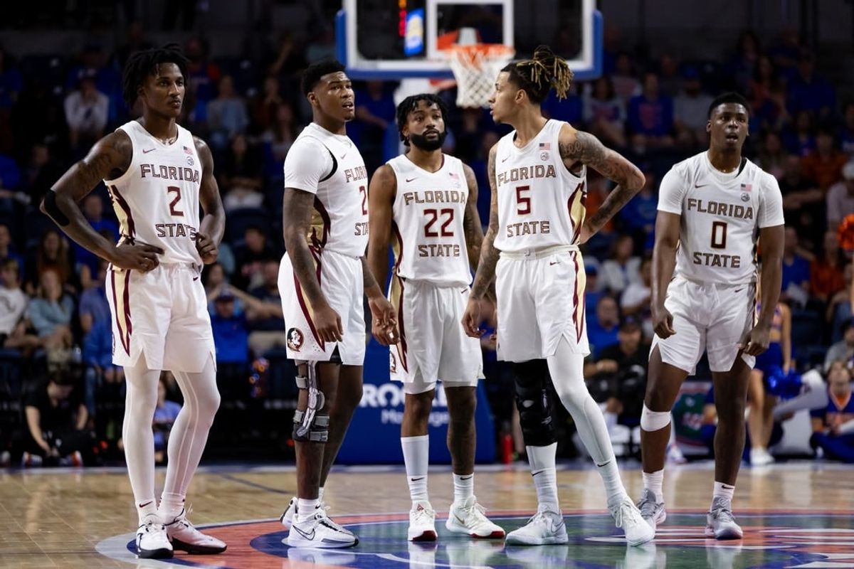 Nov 17, 2023; Gainesville, Florida, USA; Florida State Seminoles forward Jamir Watkins (2), Florida State Seminoles guard Cam'Ron Fletcher (21), Florida State Seminoles guard Darin Green Jr. (22), Florida State Seminoles forward De'Ante Green (5) and Florida State Seminoles guard Chandler Jackson (0) look on during the second half against the Florida Gators at Exactech Arena at the Stephen C. O'Connell Center.