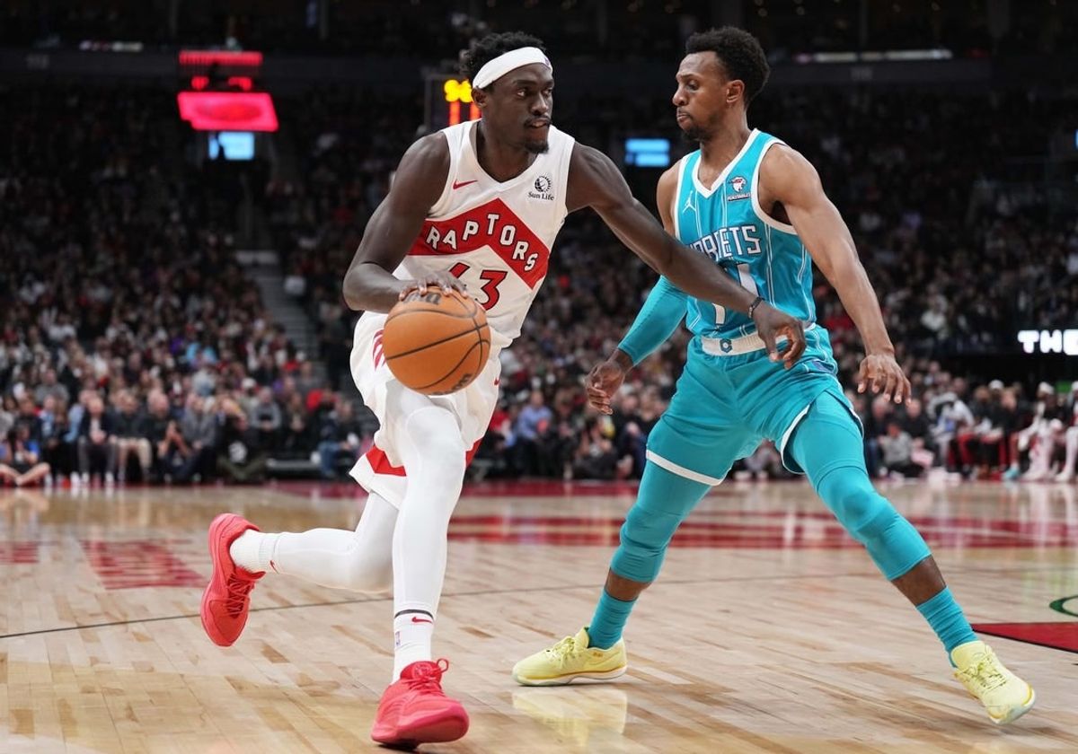 Dec 18, 2023; Toronto, Ontario, CAN; Toronto Raptors forward Pascal Siakam (43) drives to the basket as Charlotte Hornets guard Ish Smith (14) tries to defend during the second quarter at Scotiabank Arena.