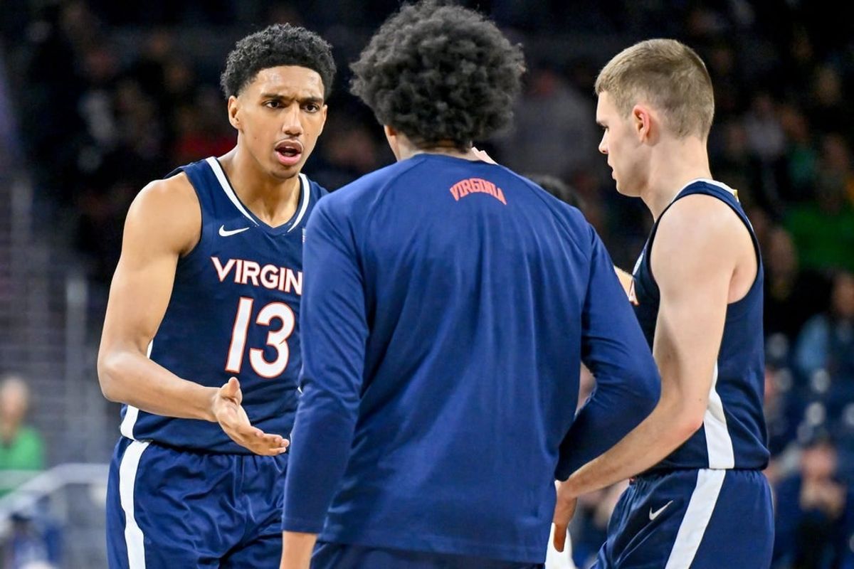Dec 30, 2023; South Bend, Indiana, USA; Virginia Cavaliers guard Ryan Dunn (13) reacts after a basket in the second half against the Notre Dame Fighting Irish at the Purcell Pavilion.