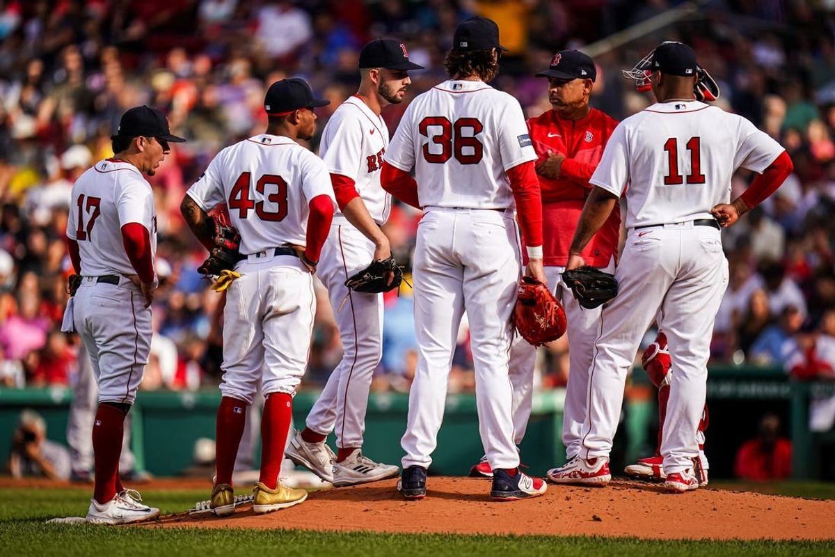 Aug 30, 2023; Boston, Massachusetts, USA; Boston Red Sox manager Alex Cora (13) brings in relief pitcher Joe Jacques (78) as they take on the Houston Astros in the third inning at Fenway Park.