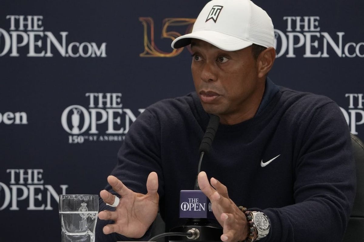 Jul 12, 2022; St. Andrews, Fife, SCT; Tiger Woods talks with the media during a press conference prior to the 150th Open Championship golf tournament at St. Andrews Old Course.