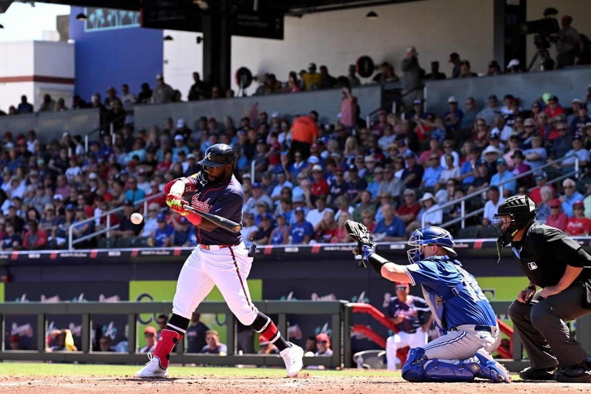Mar 20, 2024; North Port, Florida, USA; Atlanta Braves center fielder Michael Harris III (23) gets on base with a fielders choice in the second inning of a spring training game against the Toronto Blue Jays  at CoolToday Park.