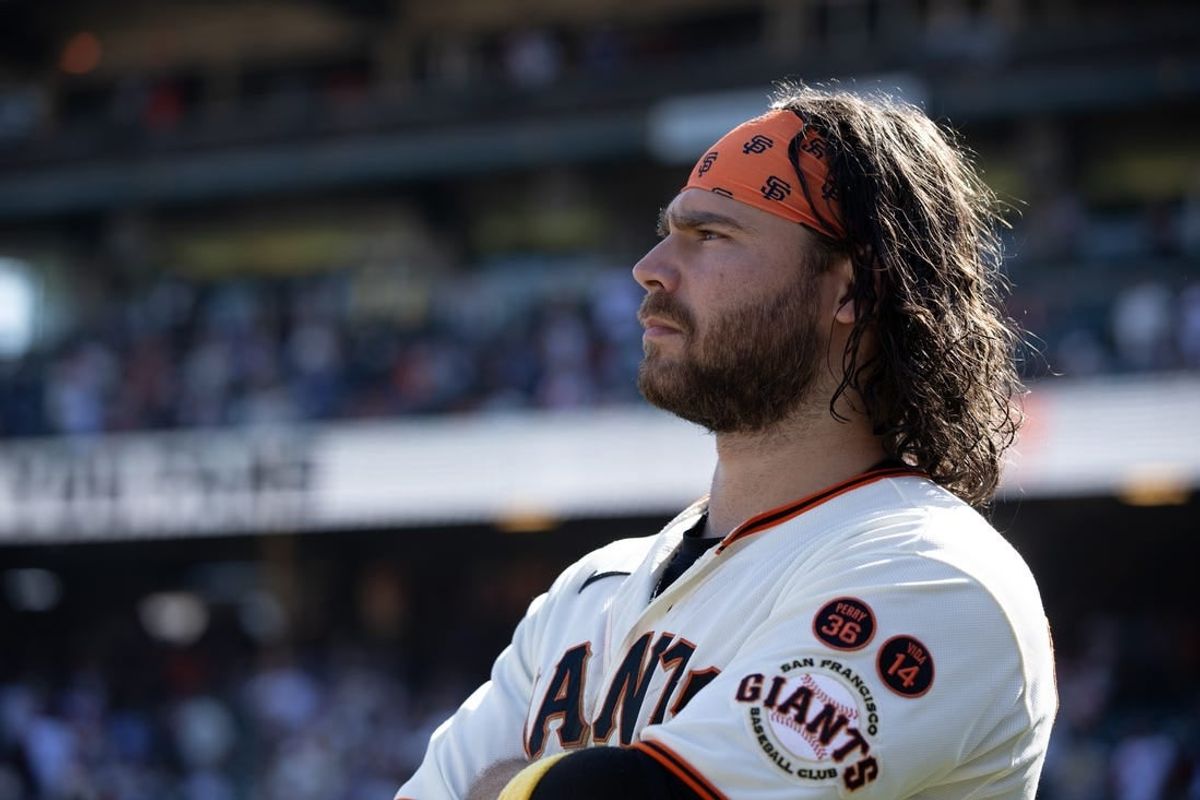 Oct 1, 2023; San Francisco, California, USA; San Francisco Giants shortstop Brandon Crawford watches a tape of season highlights following the final game of the season, against the Los Angeles Dodgers, at Oracle Park.