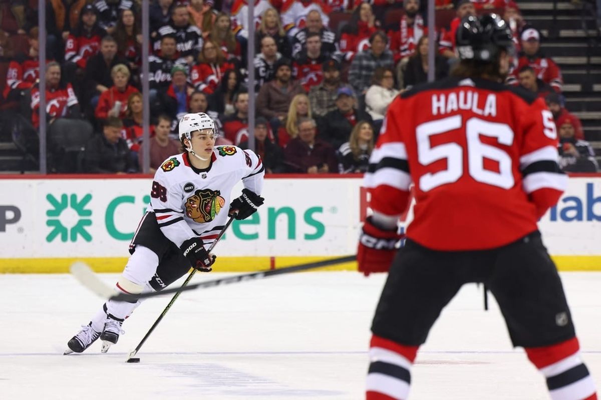 Jan 5, 2024; Newark, New Jersey, USA; Chicago Blackhawks center Connor Bedard (98) skates with the puck against the New Jersey Devils during the first period at Prudential Center.