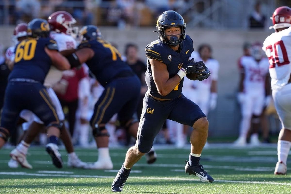 Nov 11, 2023; Berkeley, California, USA; California Golden Bears running back Jaydn Ott (1) rushes for a touchdown against the Washington State Cougars during the second quarter at California Memorial Stadium.