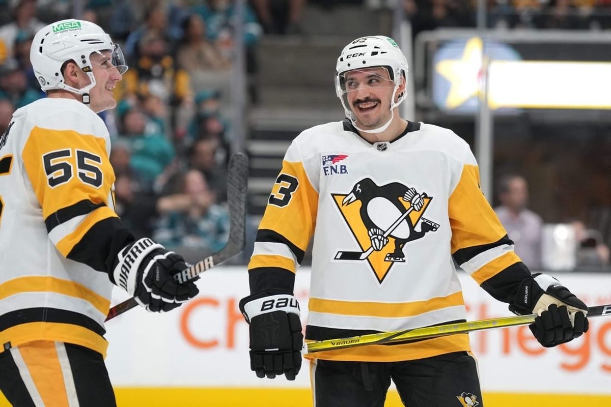 Nov 4, 2023; San Jose, California, USA; Pittsburgh Penguins left wing Matt Nieto (83) talks with center Noel Acciari (55) during the second period against the San Jose Sharks at SAP Center at San Jose.