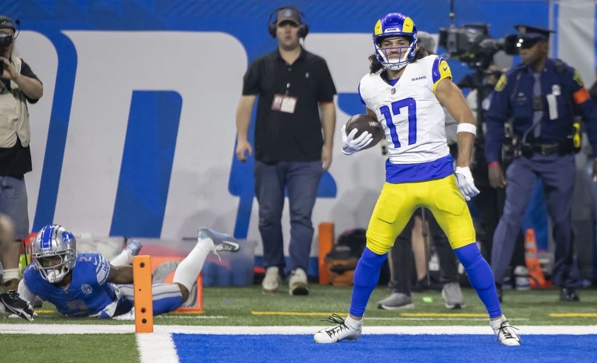 Jan 14, 2024; Detroit, Michigan, USA; Los Angeles Rams wide receiver Puka Nacua (17) scores a touchdown against Detroit Lions safety C.J. Gardner-Johnson (2) during the first half of a 2024 NFC wild card game at Ford Field.