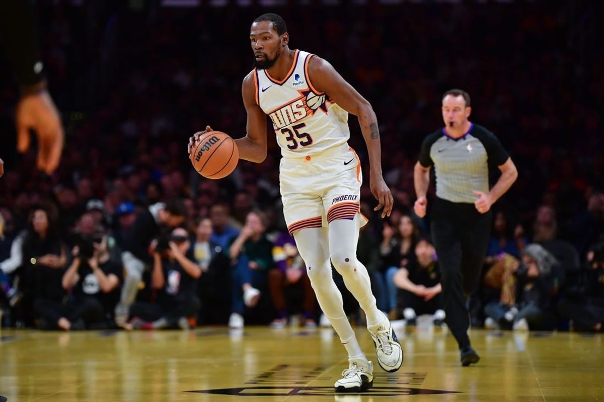 Dec 5, 2023; Los Angeles, California, USA; Phoenix Suns forward Kevin Durant (35) moves the ball up court against the Los Angeles Lakers during the second half of the In Season Tournament quarterfinal at Crypto.com Arena.