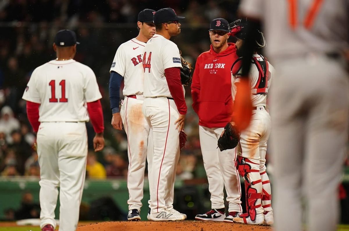 Apr 10, 2024; Boston, Massachusetts, USA; Boston Red Sox pitching coach Andrew Bailey (53) talks with pitcher Isaiah Campbell (44) as they take on the Baltimore Orioles in the sixth inning at Fenway Park.