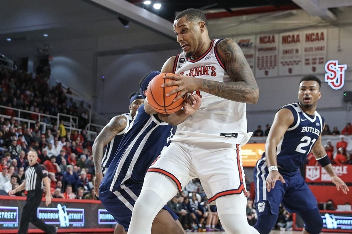 Jan 2, 2024; Queens, New York, USA; St. John's Red Storm center Joel Soriano (11) grabs a rebound in the second half against the Butler Bulldogs at Carnesecca Arena.