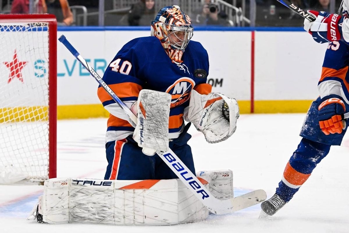 Apr 11, 2024; Elmont, New York, USA; New York Islanders goaltender Semyon Varlamov (40) makes a save against the Montreal Canadiens during the first period at UBS Arena.