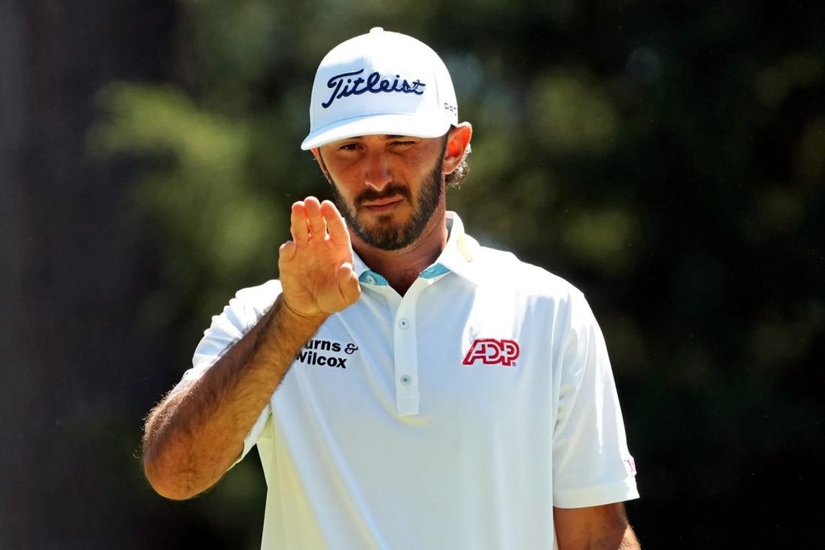 Apr 12, 2024; Augusta, Georgia, USA; Max Homa lines up his putt on the sixth green during the second round of the Masters Tournament at Augusta National Golf Club.