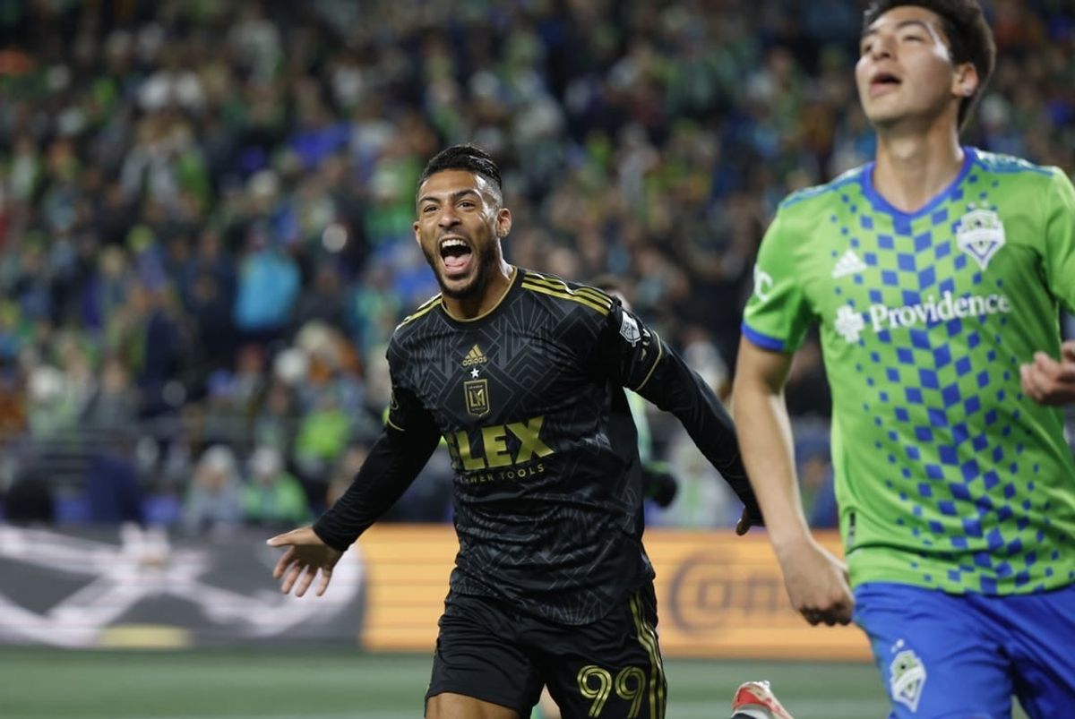 Nov 26, 2023; Seattle, Washington, USA; Los Angeles FC forward Denis Bouanga (99) reacts after scoring during the first half of a MLS Cup Western Conference Semifinal match against the Seattle Sounders at Lumen Field.