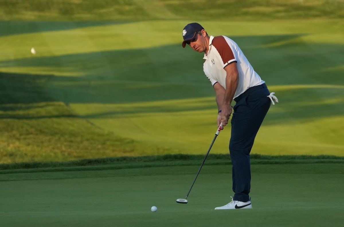 Sep 30, 2023; Rome, ITALY;  Team Europe golfer Rory McIlroy putts on the 16th green during day two fourballs round for the 44th Ryder Cup golf competition at Marco Simone Golf and Country Club.