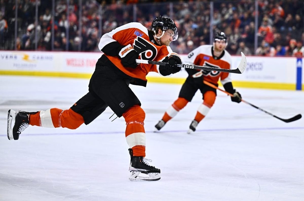 Mar 12, 2024; Philadelphia, Pennsylvania, USA; Philadelphia Flyers defenseman Travis Sanheim (6) shoots against the San Jose Sharks in the first period at Wells Fargo Center.