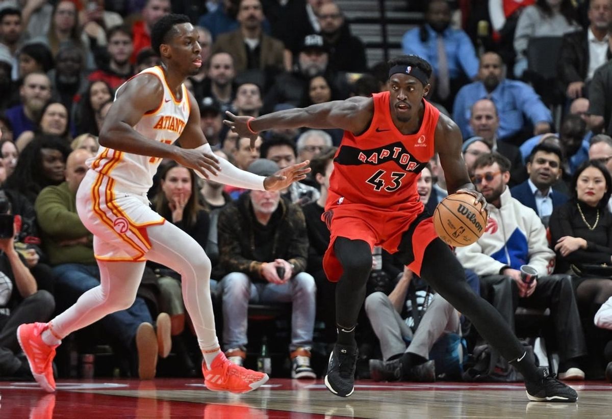 Dec 13, 2023; Toronto, Ontario, CAN;   Toronto Raptors forward Pascal Siakam (43) dribbles the ball as Atlanta Hawks forward Onyeka Okongwu (17) defends in the first half at Scotiabank Arena.
