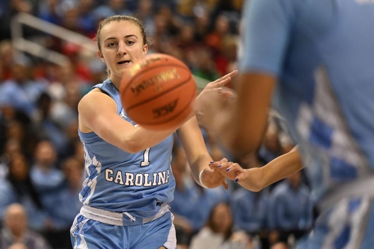 Mar 3, 2023; Greensboro, NC, USA; North Carolina Tar Heels guard Alyssa Ustby (1) passes to a teammate during the first half at Greensboro Coliseum.