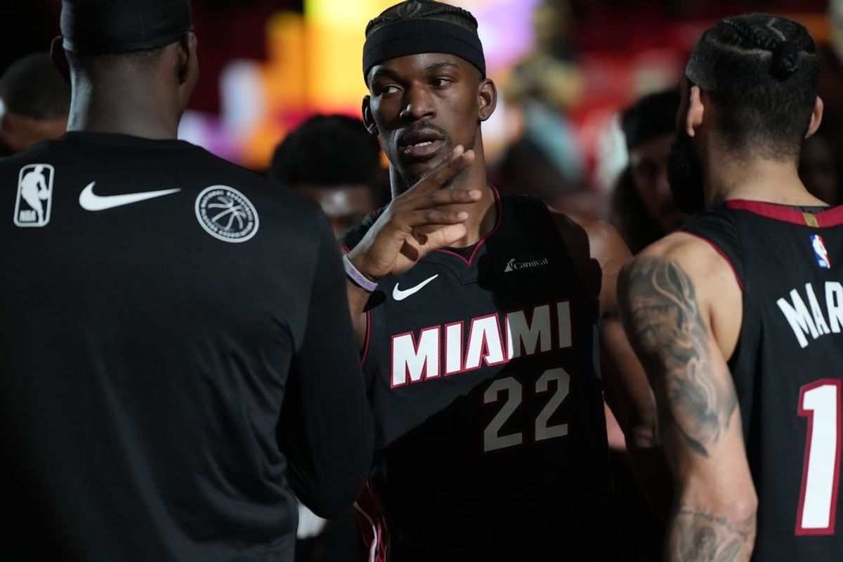 Feb 6, 2024; Miami, Florida, USA;  Miami Heat forward Jimmy Butler (22) is introduced before the game against the Orlando Magic at Kaseya Center.