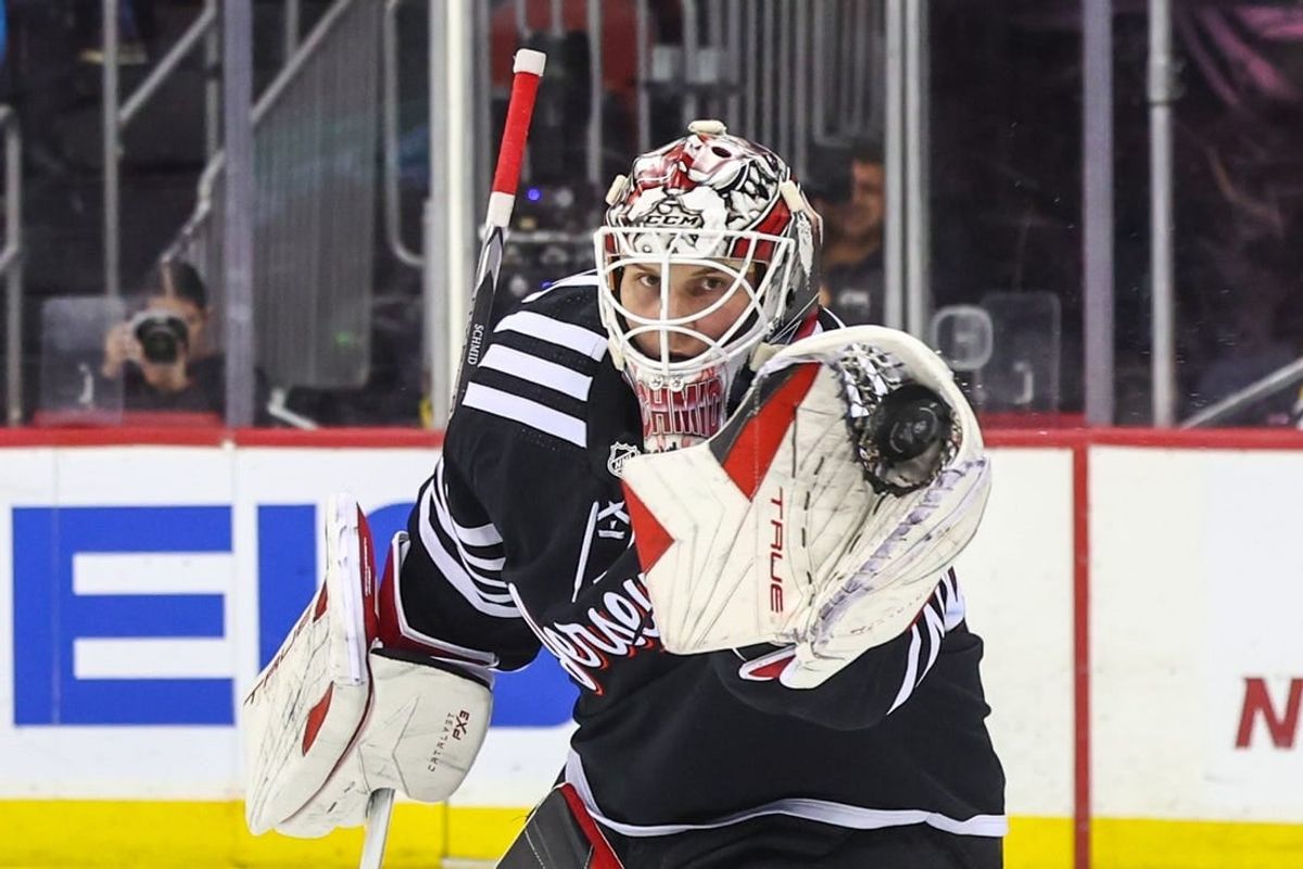 Nov 24, 2023; Newark, New Jersey, USA; New Jersey Devils goaltender Akira Schmid (40) makes a save against the Columbus Blue Jackets during the third period at Prudential Center.