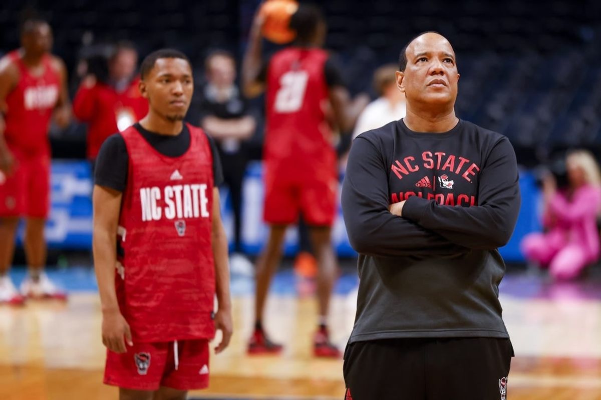 Mar 16, 2023; Denver, CO, USA; North Carolina State Wolfpack head coach Kevin Keatts watches practice before the first round of the NCAA Tournament at Ball Arena.