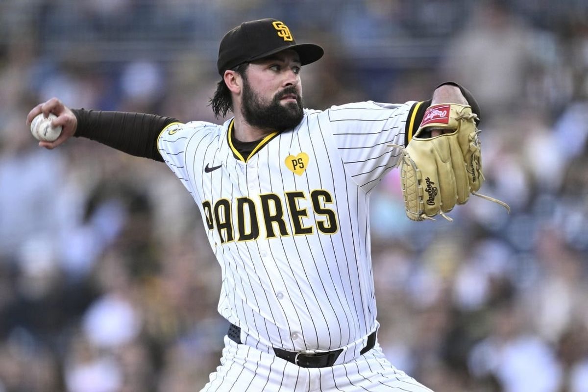 Apr 29, 2024; San Diego, California, USA; San Diego Padres starting pitcher Matt Waldron (61) throws a pitch against the Cincinnati Reds during the first inning at Petco Park.