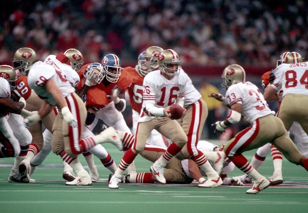 Jan 28, 1990; New Orleans, LA, USA; FILE PHOTO; San Francisco 49ers quarterback (16) Joe Montana hands to (33) Roger Craig during Super Bowl XXIV against the Denver Broncos at the Superdome.  The 49ers defeated the Broncos 55-10 to earn their fourth Super Bowl victory and their second consecutive championship. Mandatory Credit: Tony Tomsic-USA TODAY NETWORK