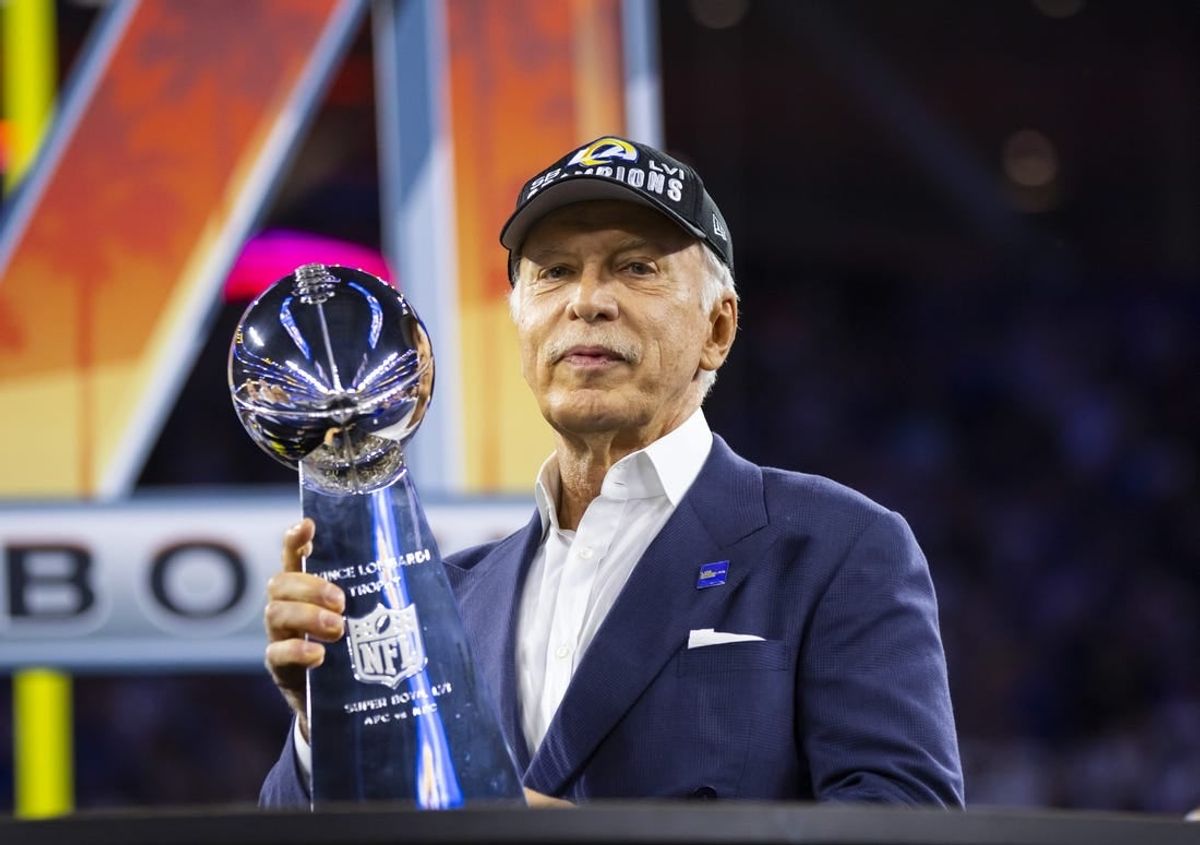 Feb 13, 2022; Inglewood, CA, USA; Los Angeles Rams owner Stan Kroenke celebrates with the Lombardi Trophy after defeating the Cincinnati Bengals during Super Bowl LVI at SoFi Stadium.