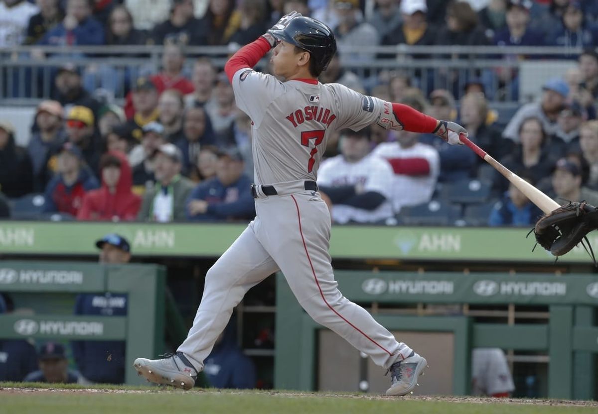 Apr 20, 2024; Pittsburgh, Pennsylvania, USA;  Boston Red Sox designated hitter  Masataka Yoshida (7) hits a two run home run against he Pittsburgh Pirates during the sixth inning at PNC Park.