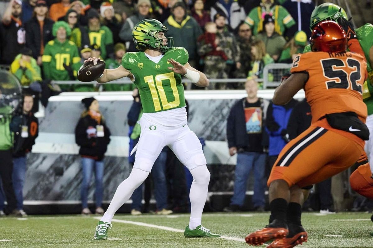 Nov 24, 2023; Eugene, Oregon, USA; Oregon Ducks quarterback Bo Nix (10) throws a pass during the first half against the Oregon State Beavers at Autzen Stadium.
