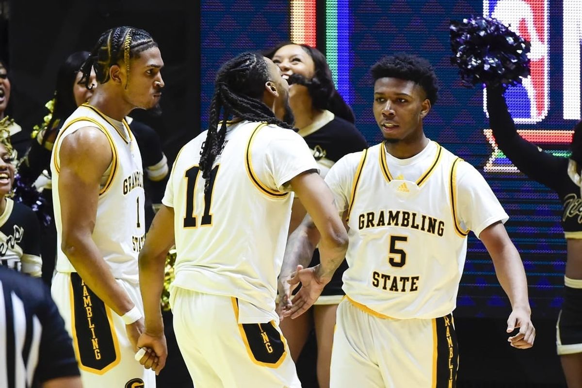 Feb 18, 2023; Salt Lake City, Utah, USA; Grambling State University Tigers forward Jourdan Smith (11) celebrates after a basket by guard Tra'Michael Moton (5) against the Southern University Jaguars during overtime at the Jon M. Huntsman Center.