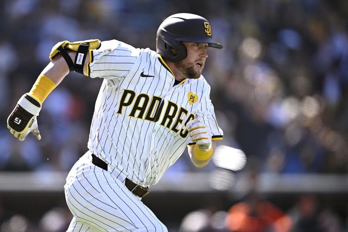 Mar 28, 2024; San Diego, California, USA; San Diego Padres first baseman Jake Cronenworth (9) watches his two-RBI double against the San Francisco Giants during the seventh inning at Petco Park.
