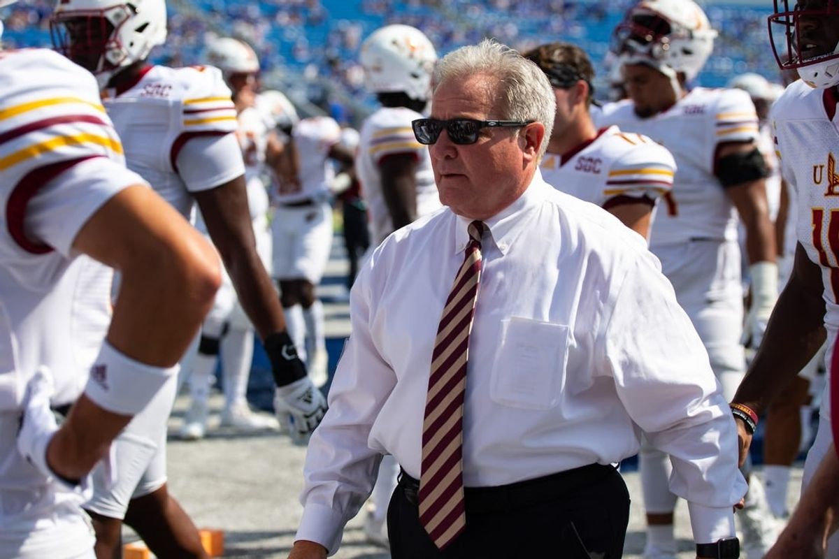 Sep 4, 2021; Lexington, Kentucky, USA; Louisiana Monroe Warhawks head coach Terry Bowden walks with his team before the game against the Kentucky Wildcats at Kroger Field.