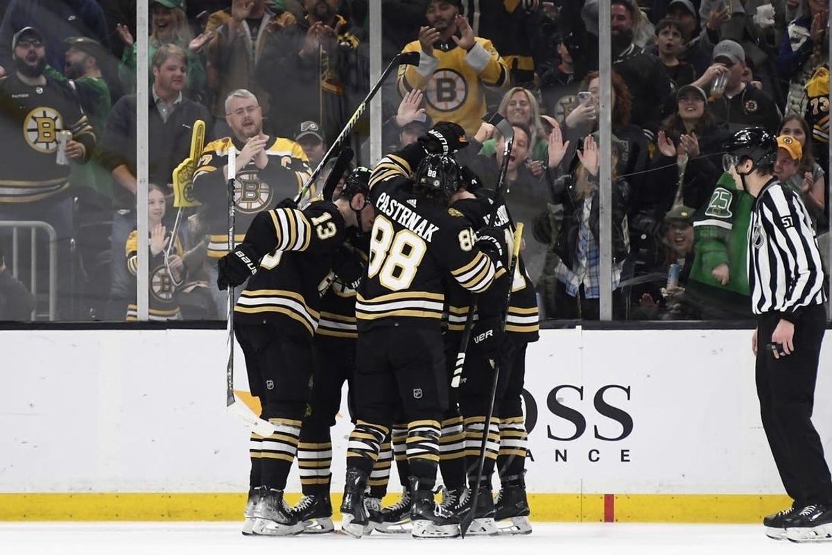 Mar 16, 2024; Boston, Massachusetts, USA; Boston Bruins center Charlie Coyle (13) celebrates his goal with his teammates during the second period against the Philadelphia Flyers at TD Garden.