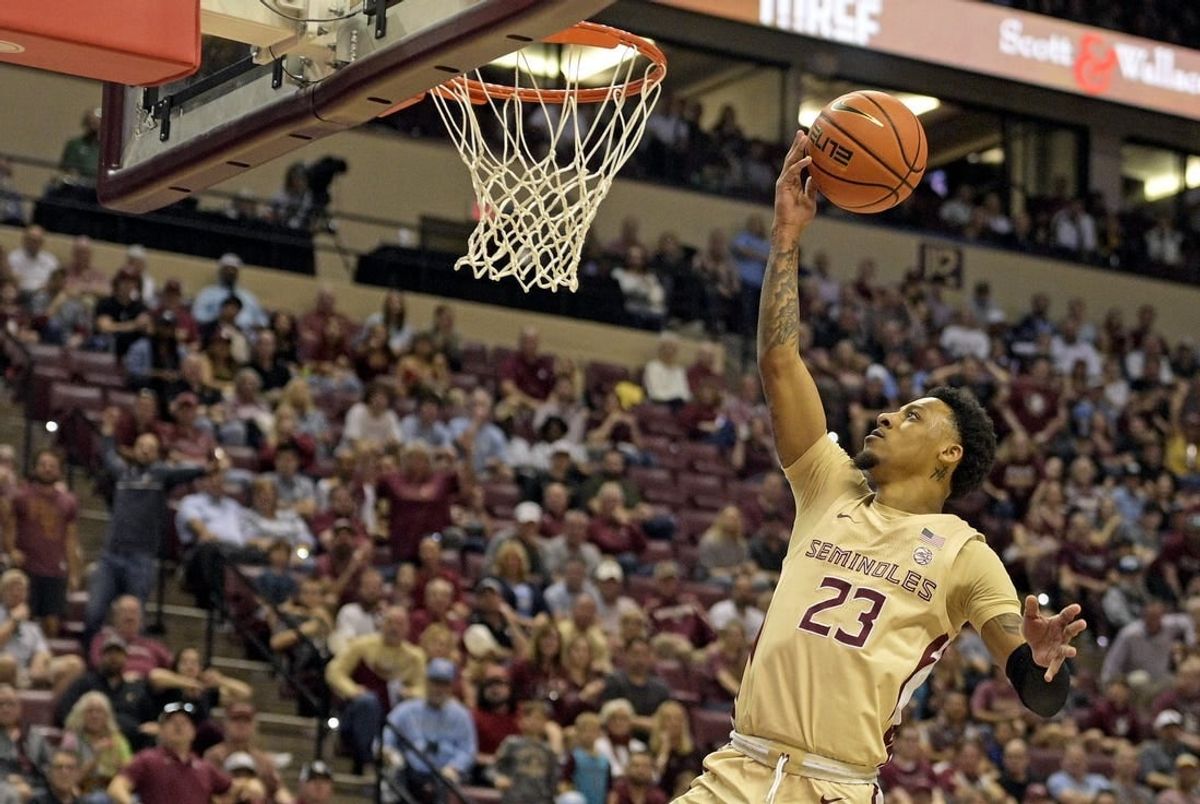 Jan 27, 2024; Tallahassee, Florida, USA; Florida State Seminoles guard Primo Spears (23) shoots the ball against the North Carolina Tarheels during the first half at Donald L. Tucker Center.