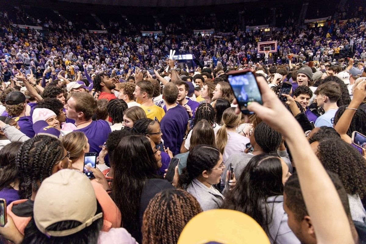 Feb 21, 2024; Baton Rouge, Louisiana, USA; LSU Tigers storm the court after the LSU Tigers defeat the Kentucky Wildcats after the game at Pete Maravich Assembly Center.