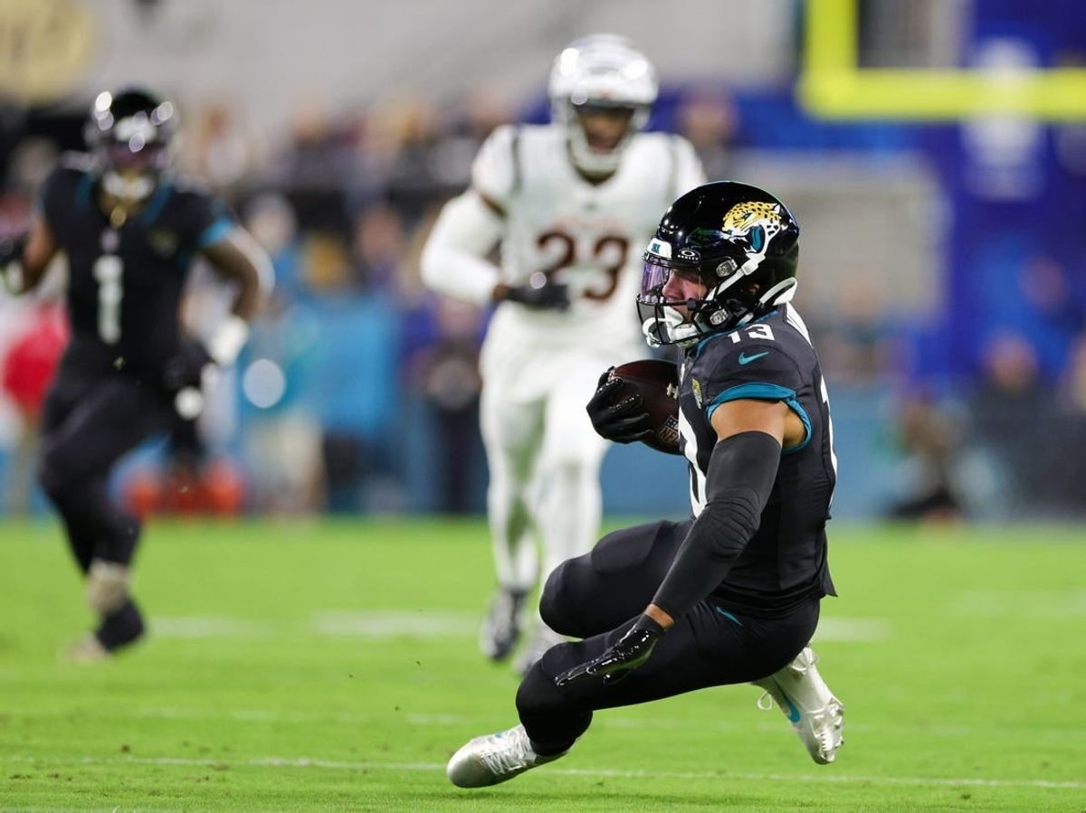 Dec 4, 2023; Jacksonville, Florida, USA;  Jacksonville Jaguars wide receiver Christian Kirk (13) catches a pass against the Cincinnati Bengals in the first quarter at EverBank Stadium.
