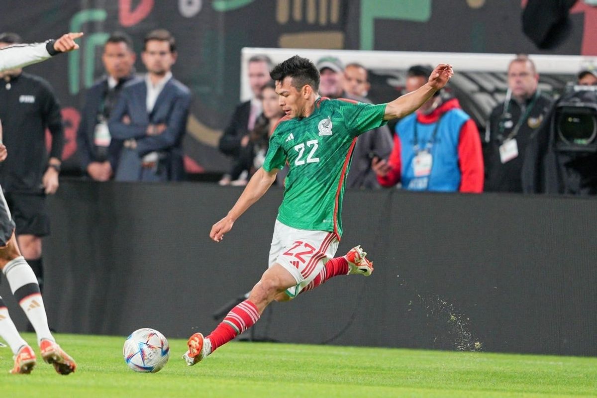 Oct 17, 2023; Philadelphia, PA, USA; Mexico midfielder Hirving Lozano (22) kicks the ball against Germany in the first half at Lincoln Financial Field.