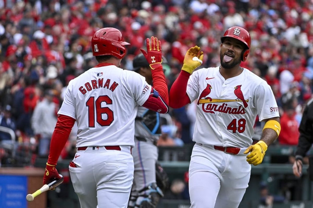 Apr 4, 2024; St. Louis, Missouri, USA;  St. Louis Cardinals catcher Ivan Herrera (48) celebrates with second baseman Nolan Gorman (16) after hitting a sol.o home run against the Miami Marlins during the second inning at Busch Stadium.