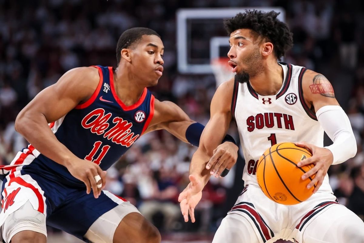 Feb 6, 2024; Columbia, South Carolina, USA; South Carolina Gamecocks guard Jacobi Wright (1) attempts to get around Mississippi Rebels guard Matthew Murrell (11) in the first half at Colonial Life Arena.