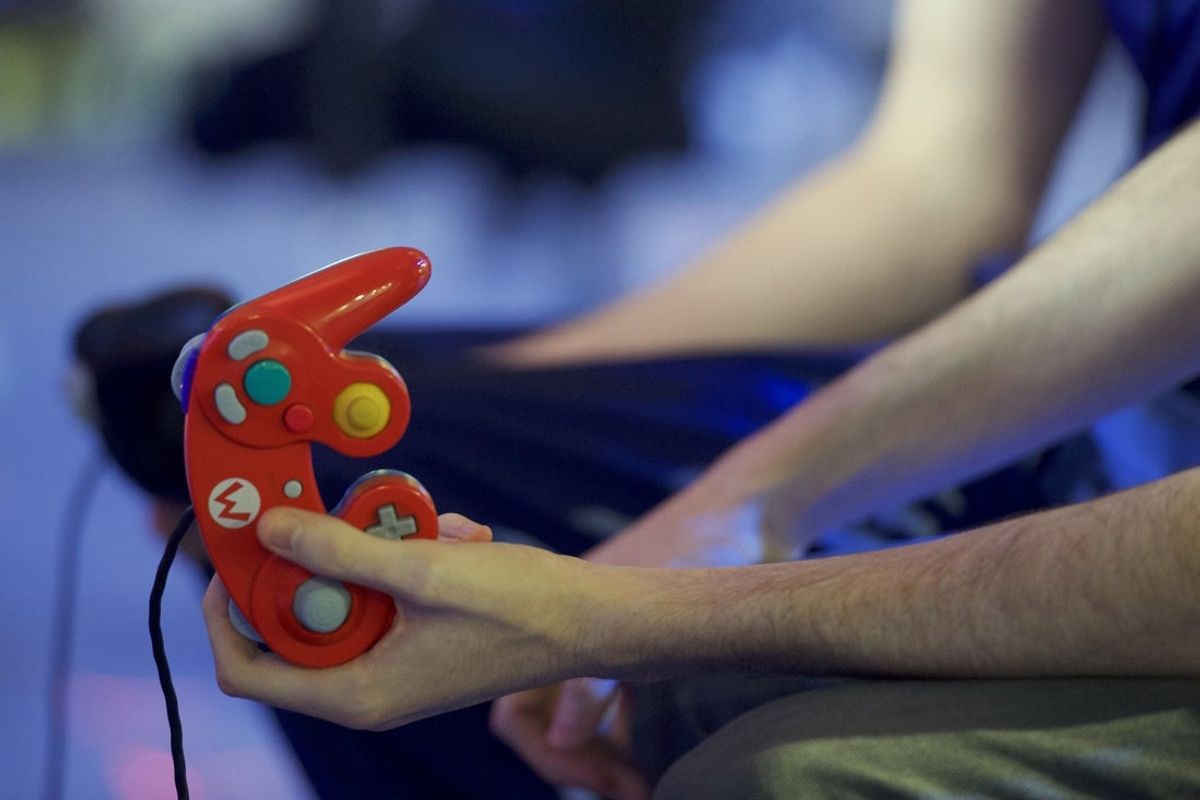 Aug 14, 2016; Chantilly, VA, USA; A contestant hold his controller during the Super Smash Bros Melee tournament at Dulles Expo Center during Super Smash Con. Mandatory Credit: Rafael Suanes-Imagn Images