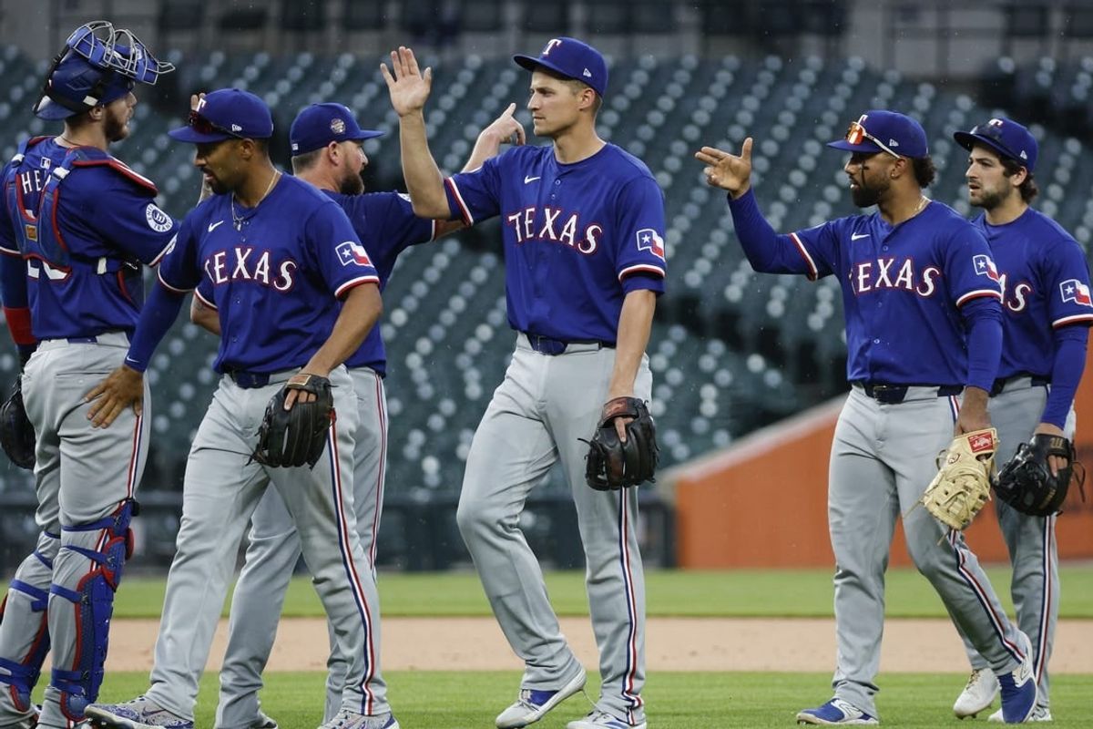 Apr 17, 2024; Detroit, Michigan, USA; Texas Rangers players celebrate their win over the Detroit Tigers following the game at Comerica Park.