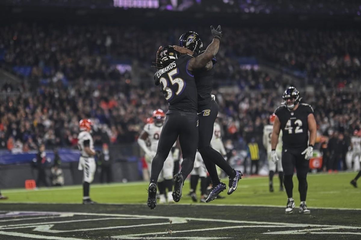 Nov 16, 2023; Baltimore, Maryland, USA;  Baltimore Ravens running back Gus Edwards (35) celebrates with quarterback Lamar Jackson (8) after scoring a second half touchdown  against the Cincinnati Bengals at M&T Bank Stadium.